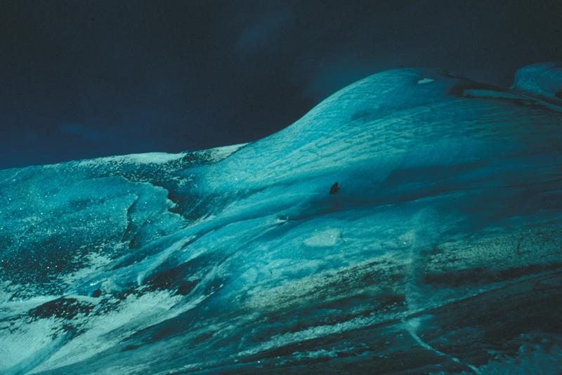 3 researchers atop large composite iceberg 1996